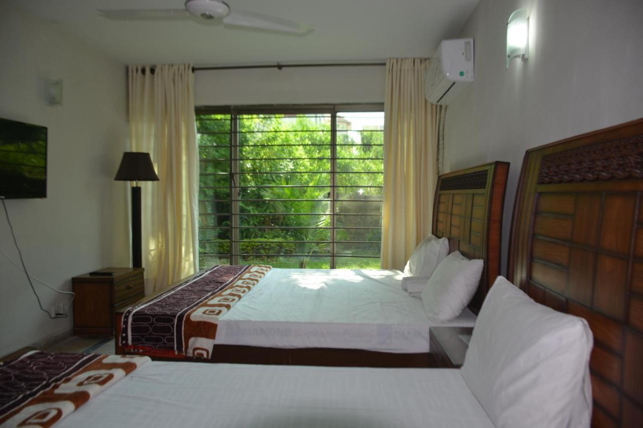 Hôtel The Travelers Den à Islamabad Extérieur photo
