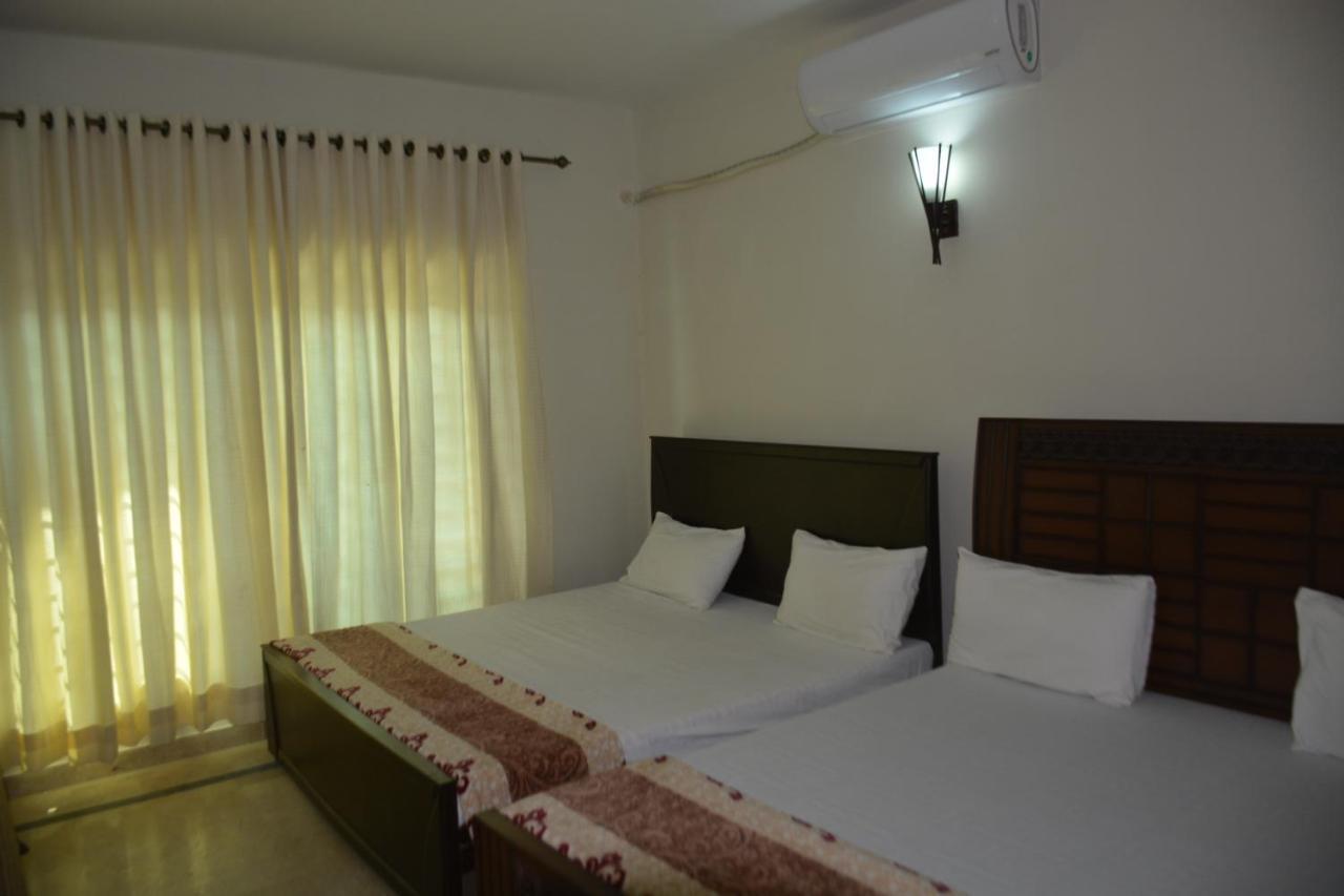 Hôtel The Travelers Den à Islamabad Extérieur photo